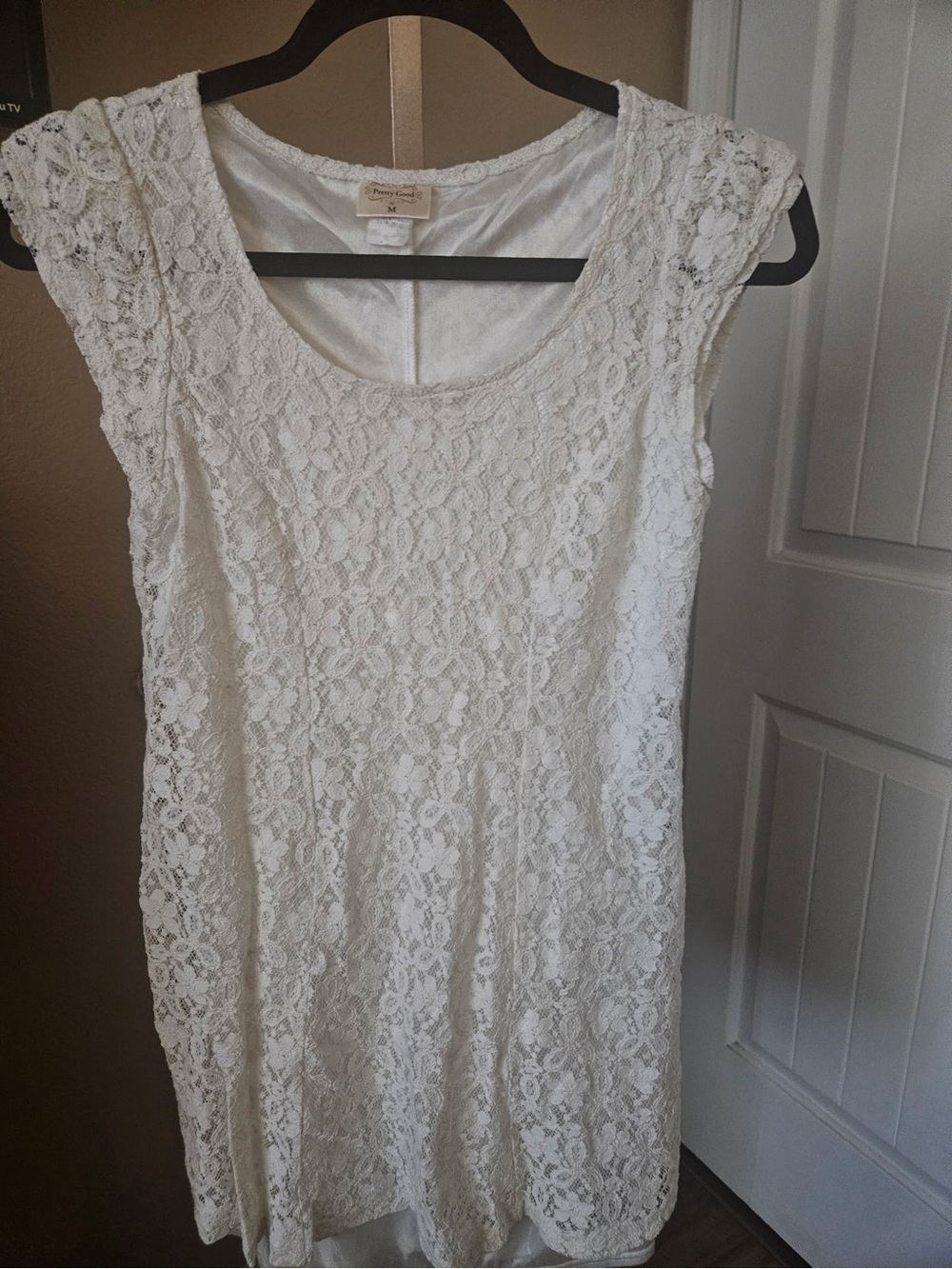 Pretty Good floral lace dress features cap sleeves and a lined interior